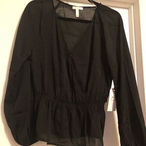 Black long sleeve peplum wrap top size Large.